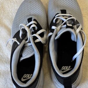 Nike men's Gray and Black Golf Shoes.